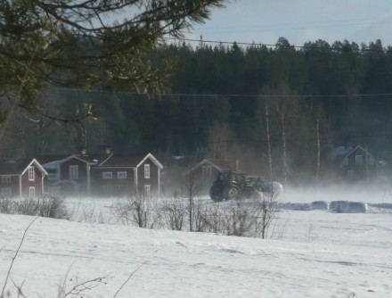 Traktor med bal i yrvädret
